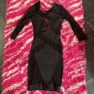 Small all black dress with sheer slits
